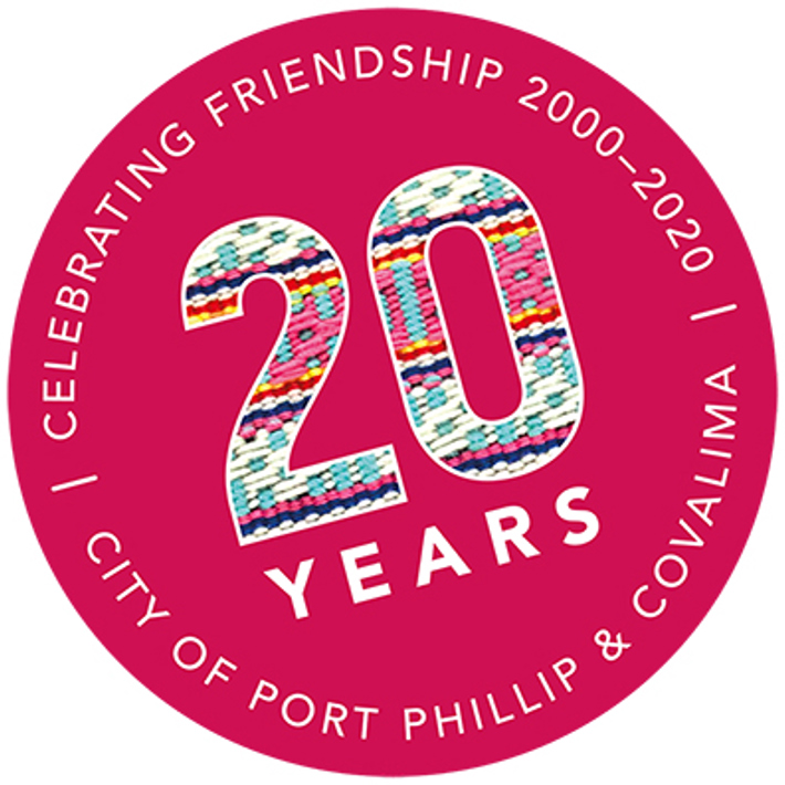 Friends of Suai 20-year pink circular logo with text reading: 20 years Celebrating Friendship 2000-2020, City of Port Phillip and Covalima