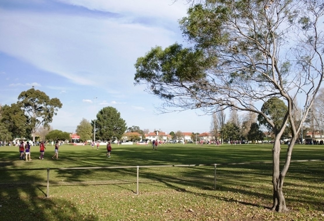 Local aussie rules game being played on JL Murphy Reserve
