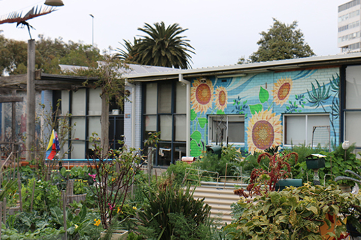 View of the exterior of the Shakespeare Grove Artist Studios looking across the farmers garden