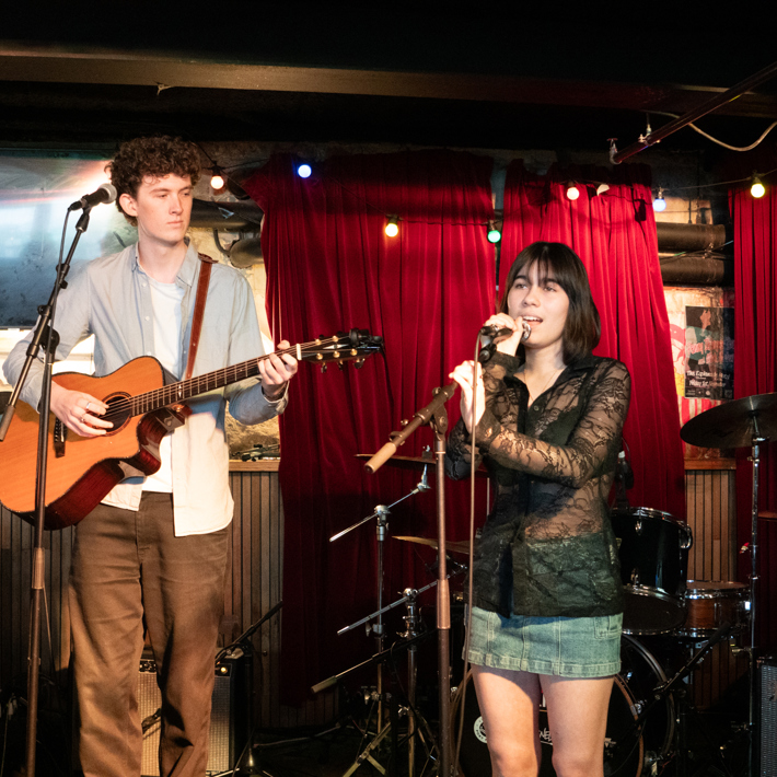 Two young musicians performing on stage at Rawkus Live at The Espy, St Kilda