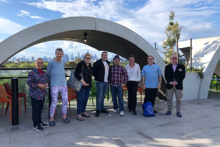 A group of people standing on the roof of the Victorian Pride Centre in St Kilda