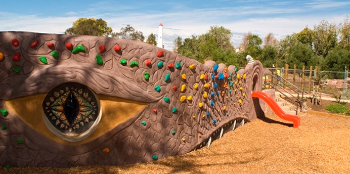 Playground facilities for use at Garden City Reserve designed around a dragons head