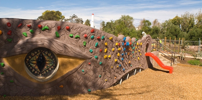 Playground facilities for use at Garden City Reserve designed around a dragons head