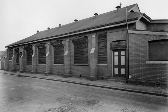 exterior view of an old brick hall