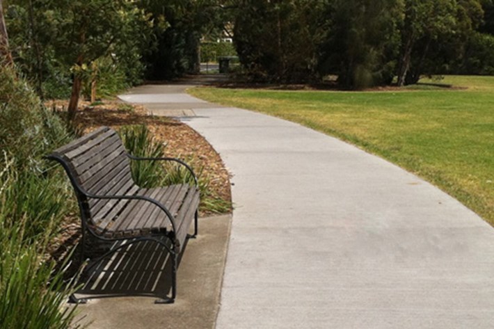 Seating is provided along the pathway in Lagoon Reserve