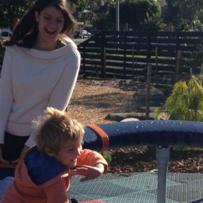 Woman and child enjoying playing on the equipment at Lyle Iffla Reserve
