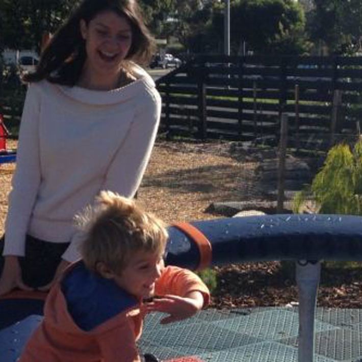 Woman and child enjoying playing on the equipment at Lyle Iffla Reserve