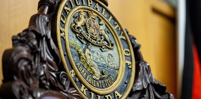 An ornate crest that reads Municipality of St Kilda