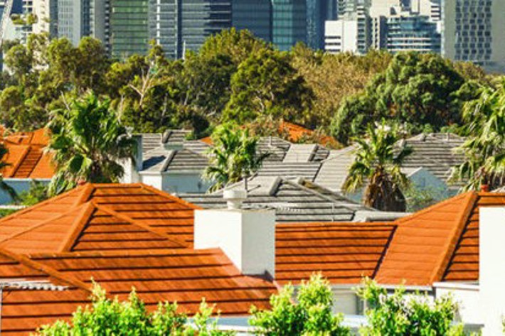 View over rooftops looking towards the Melbourne City skyline