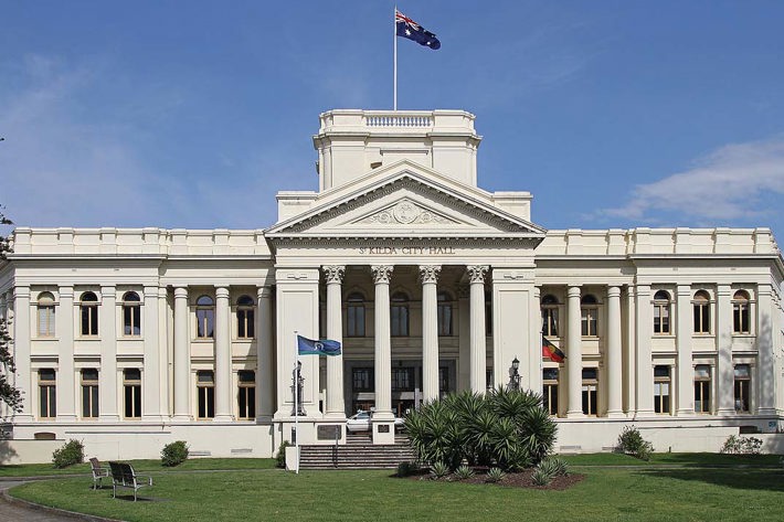 Historic part of St Kilda Town Hall shown from the front in the day time