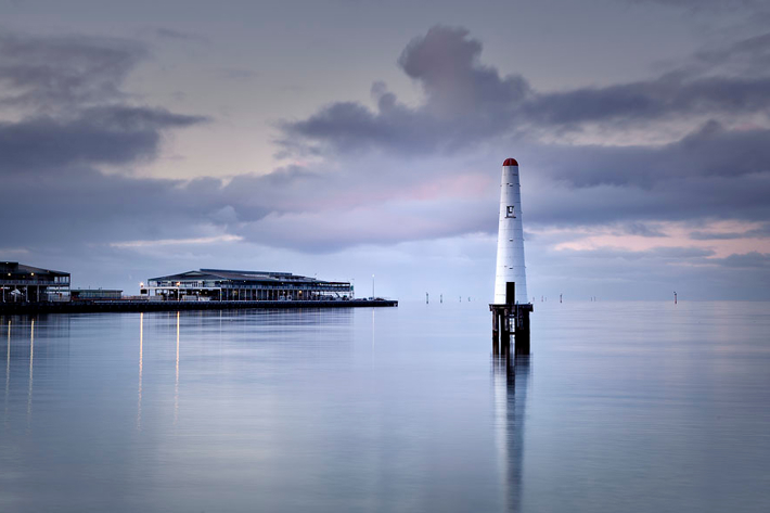 Still water surrounding the lighthouse at Beacon Cove