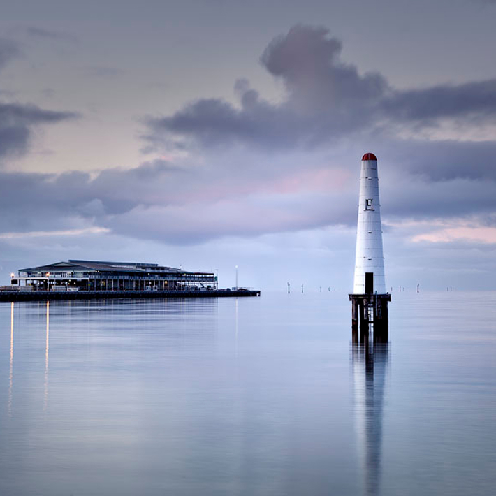 Still water surrounding the lighthouse at Beacon Cove