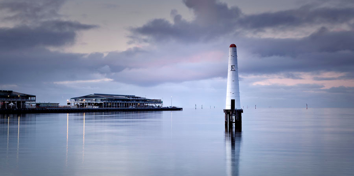 Still water surrounding the lighthouse at Beacon Cove