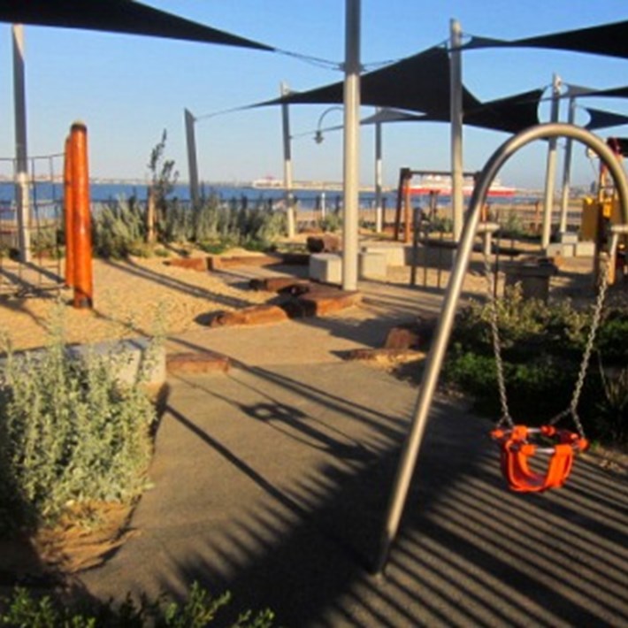 A junior swing is available for use at the Plum Garland playground