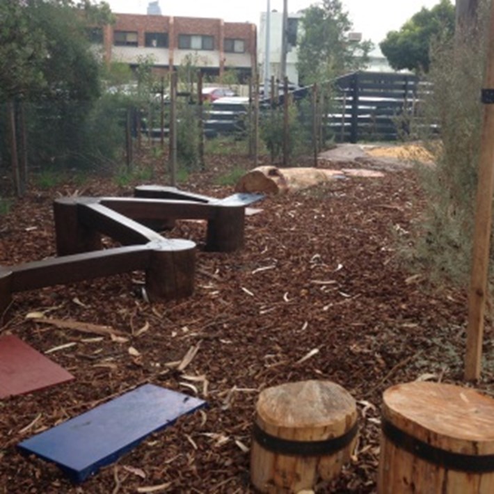 The playground includes log steps