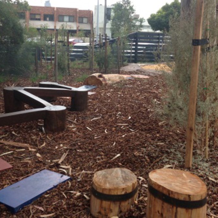 The playground includes log steps