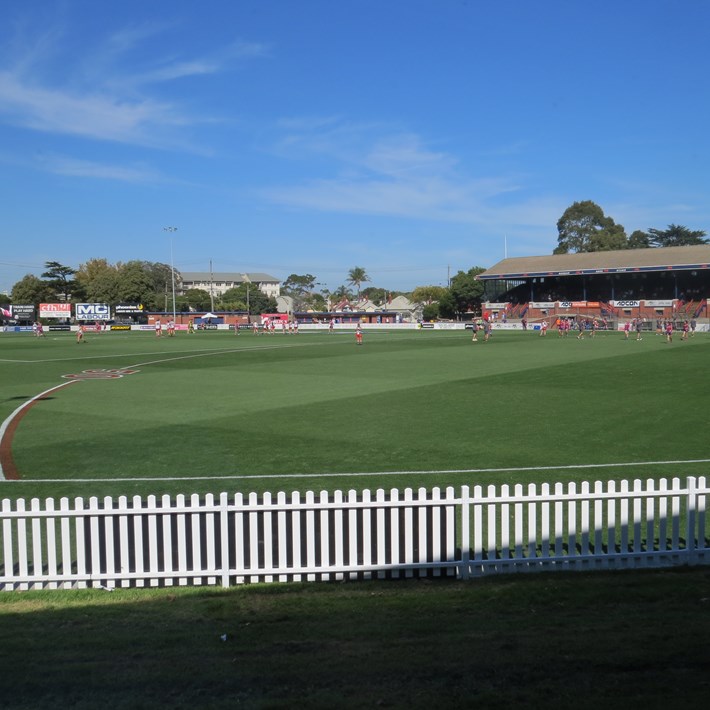 A game of aussie rules being played on North Port Oval