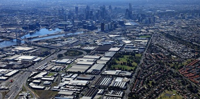 Aerial photo of the Fishermans Bend Urban Renewal Area in Melbourne, showing the industrial precinct of Sandridge and the Westgate Freeway