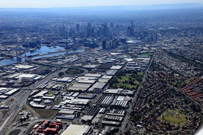 Aerial photo of the Fishermans Bend Urban Renewal Area in Melbourne, showing the industrial precinct of Sandridge and the Westgate Freeway