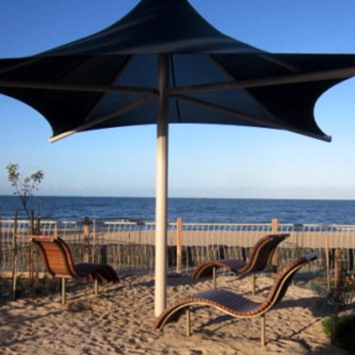 Umbrella shade and recliner seating with a view of the Bay