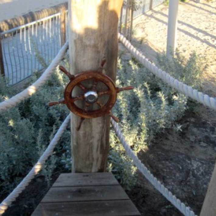 Boat wheel looking out to the Bay
